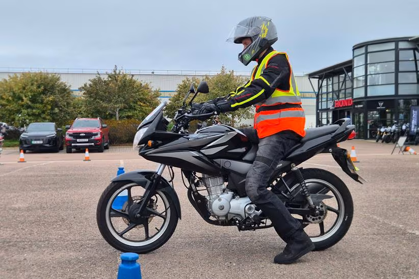 Oli Purkis learning to ride aboard a Honda CBF125