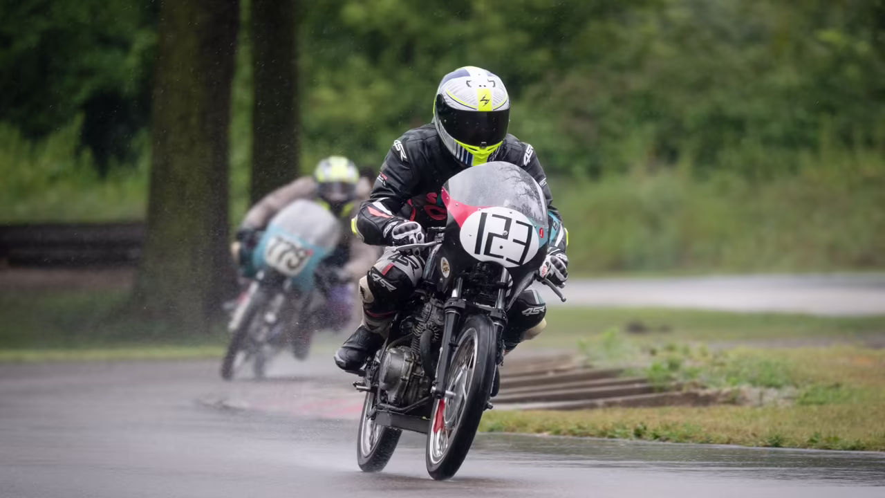 Jonas Stein (123), Trever Scales (779) at Blackhawk Raceway in the rain. Photo by Cathy Drexler.