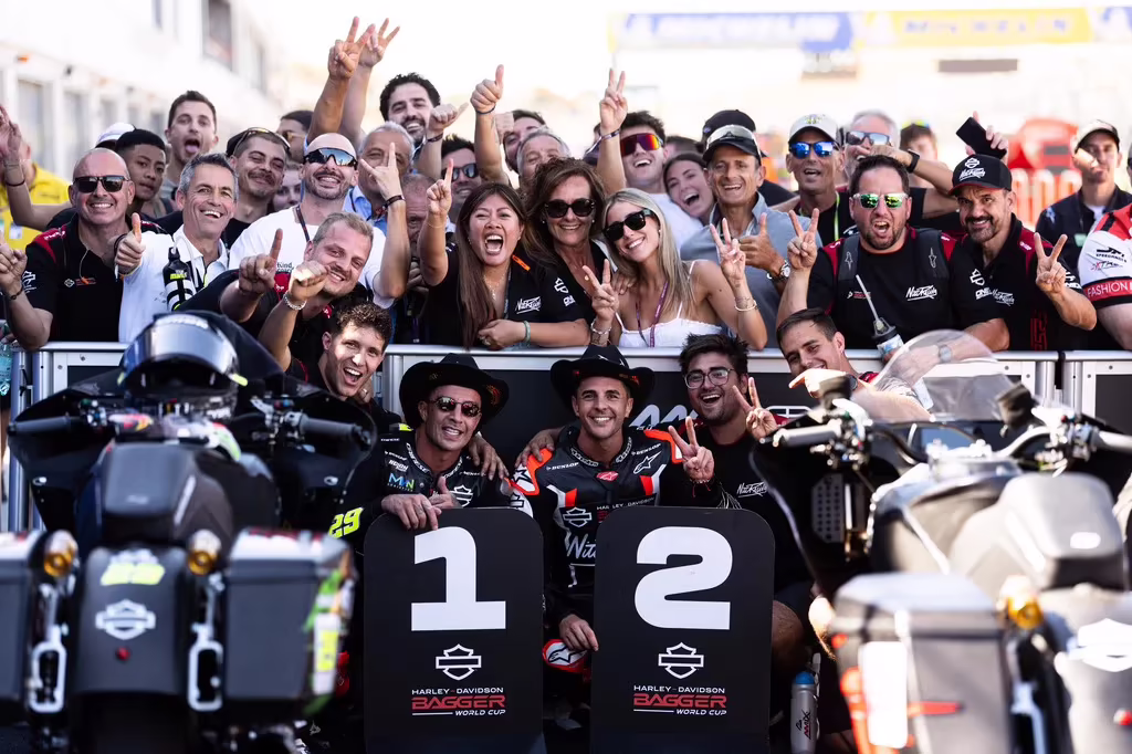 Andrea Iannone celebrating a race win at Aragon.