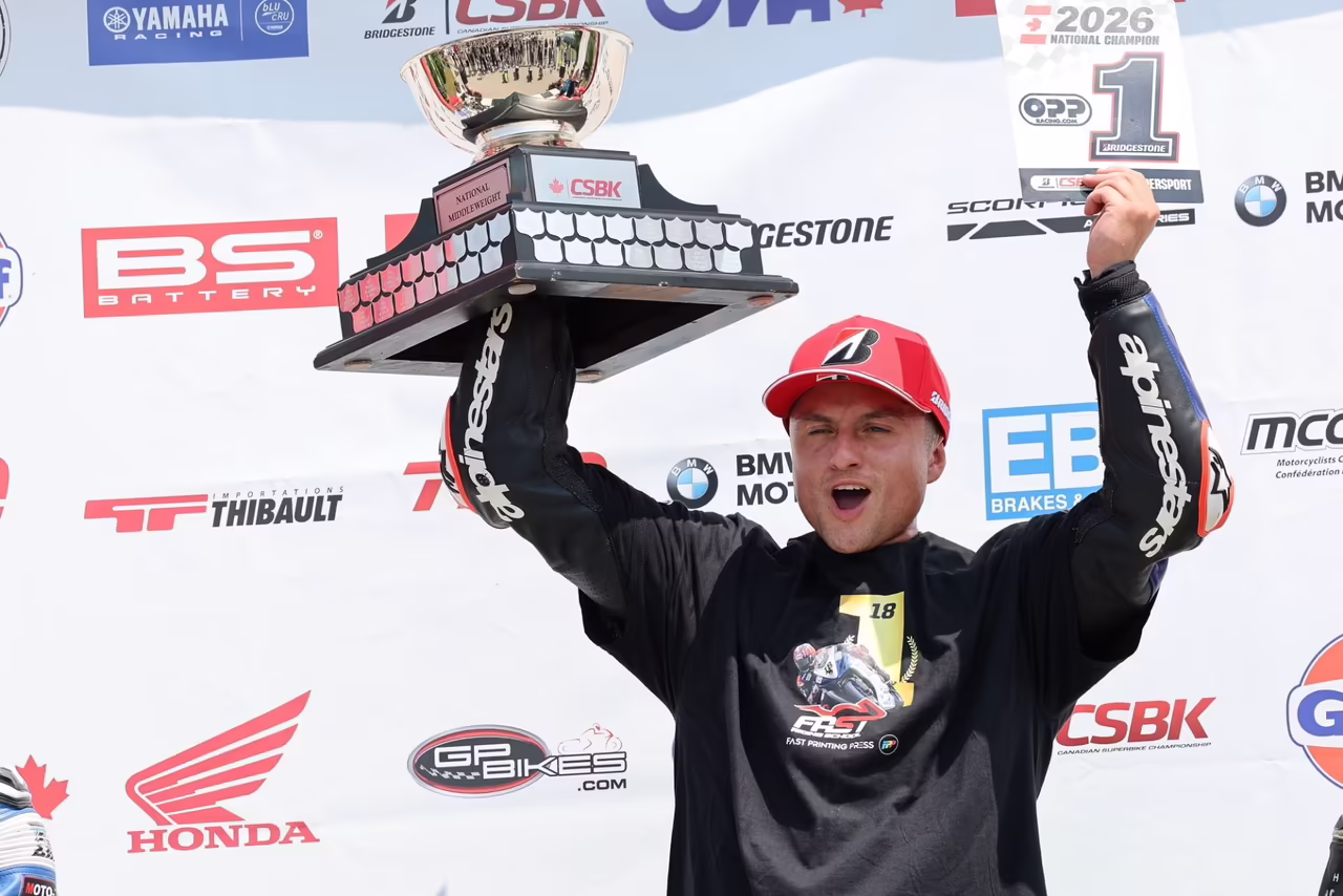 Tomas Casas celebrates on the podium at Canadian Tire Motorsport Park after clinching his third Pro Supersport championship. Photo by Rob O’Brien.