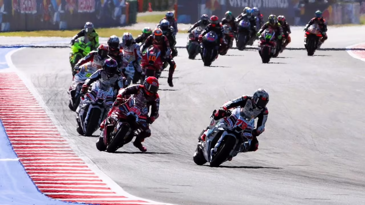 Bezzecchi leads Marquez, opening lap, 2026 Misano MotoGP. © Gold and Goose
