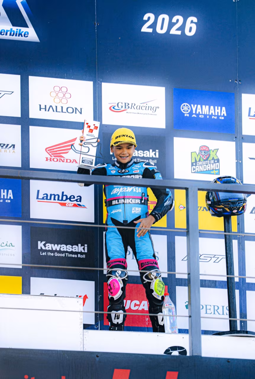 Maverick Johnson on the ESBK podium holding his 3rd place trophy at Circuito de Navarra. Photo by The Bulb Project.