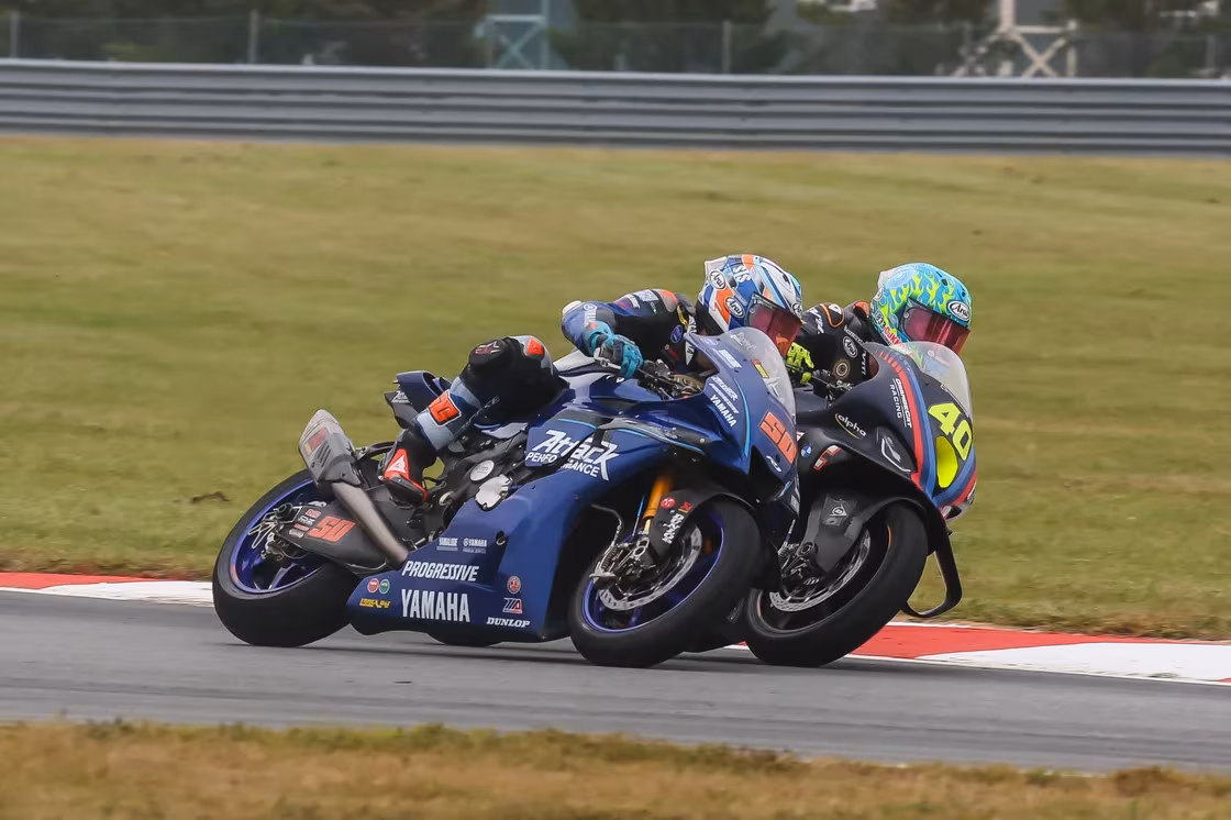 Kelly (#40) maintains an advantage of two points over Fong (#50). Sunday will crown one of them champion. Photo by Brian J. Nelson.