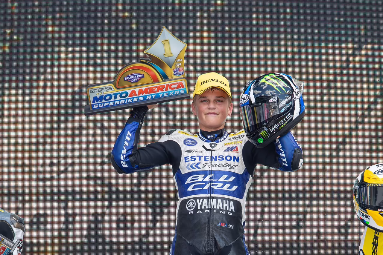 Sam Drane on the podium after claiming victory in Talent Cup race 2. Photo by Brian J. Nelson.