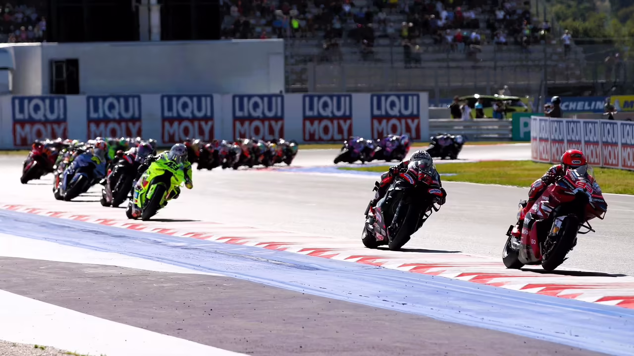 Marc Marquez leads Marco Bezzecchi, 2026 Misano MotoGP Sprint. © Gold and Goose