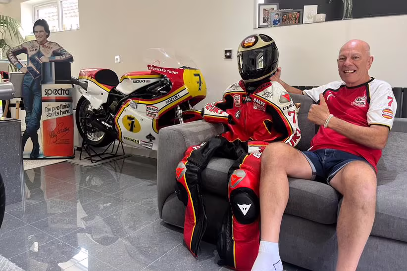 Barry Sheene super fan Clive Parkinson poses with his new suit