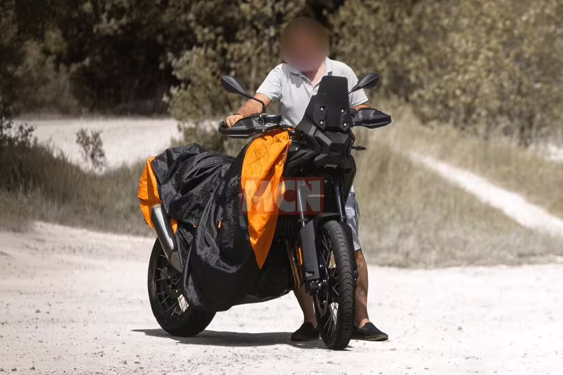 BMW F650GS prototype held by a rider