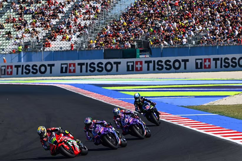 Joan Mir ahead of a trio of Yamaha riders at Misano